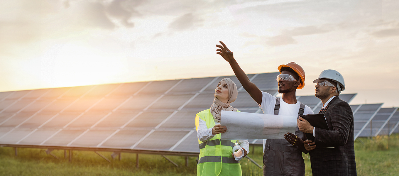 a group of engineers at a renewable energy farm